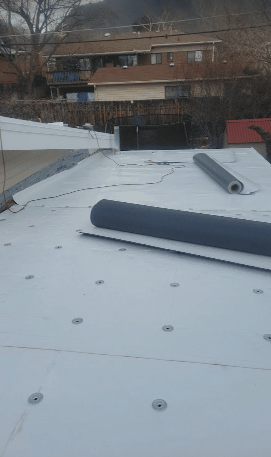 TPO Rolls on Roof Replacement Job