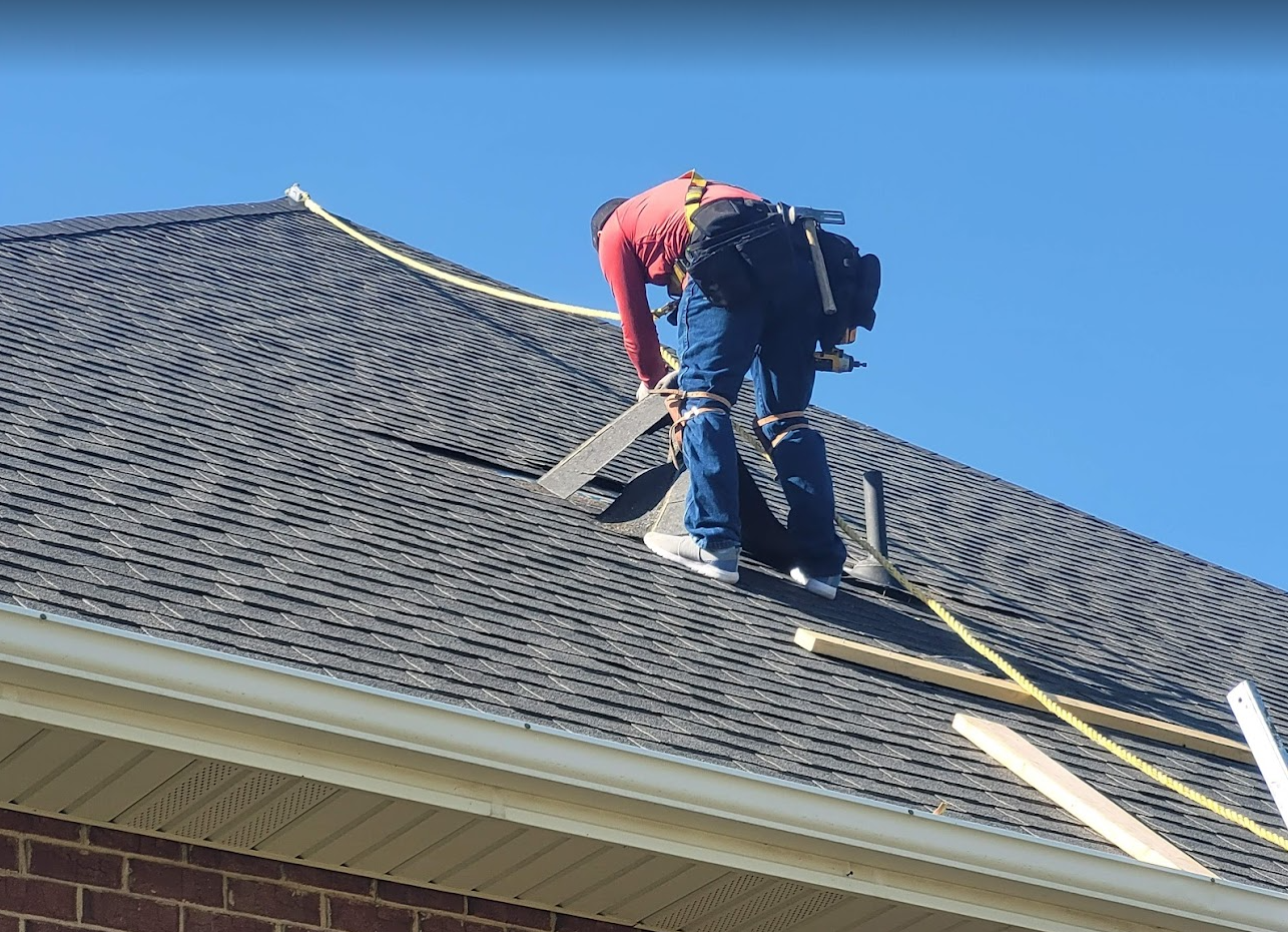 Shingle Roof Repair on Steep Pitch